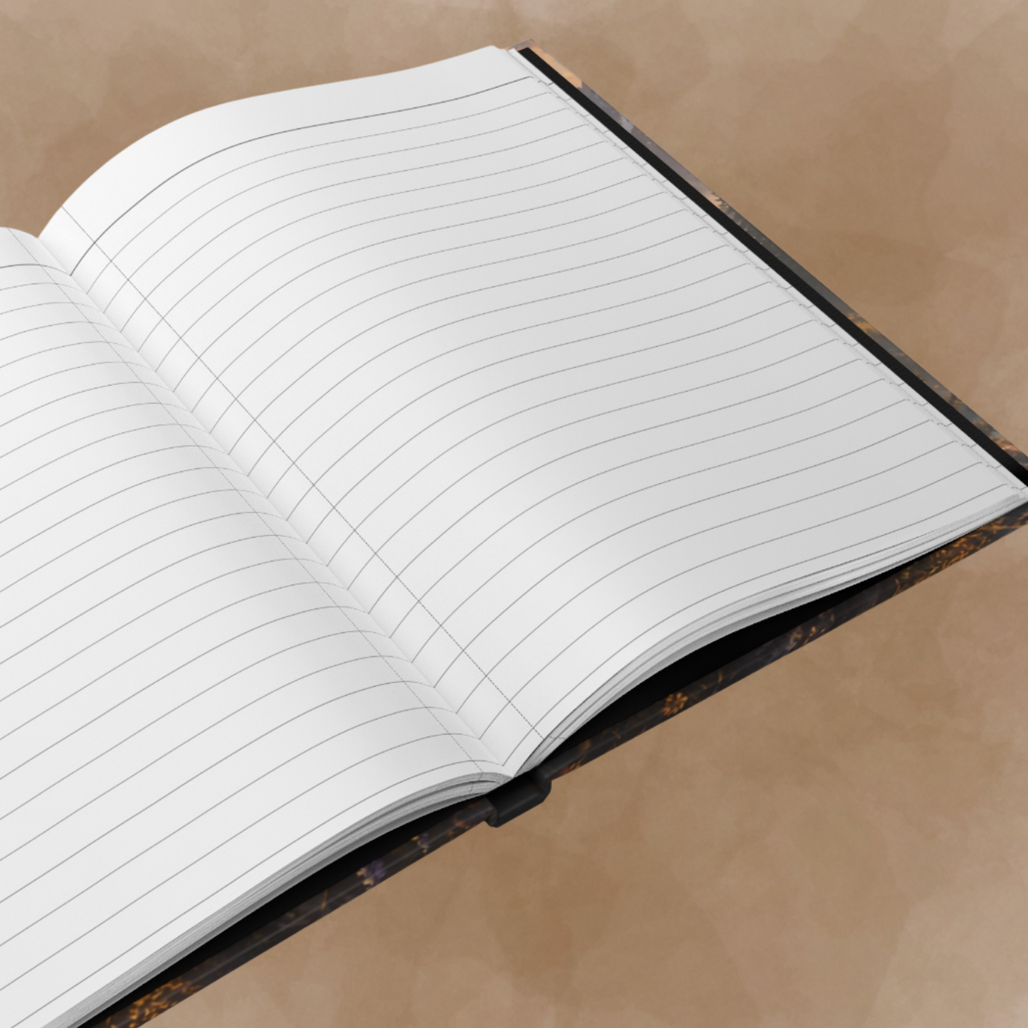 An open lined notebook with white pages and thin gray ruling, photographed at an angle on a warm beige textured background.