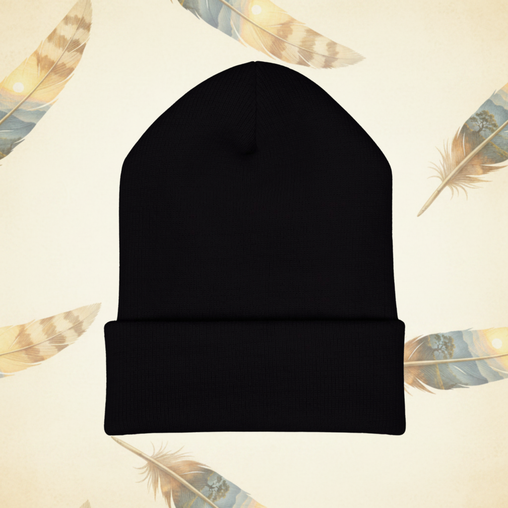 Black American EverWild Beanie flat-lay from the back on a cream-colored background of painted feathers.