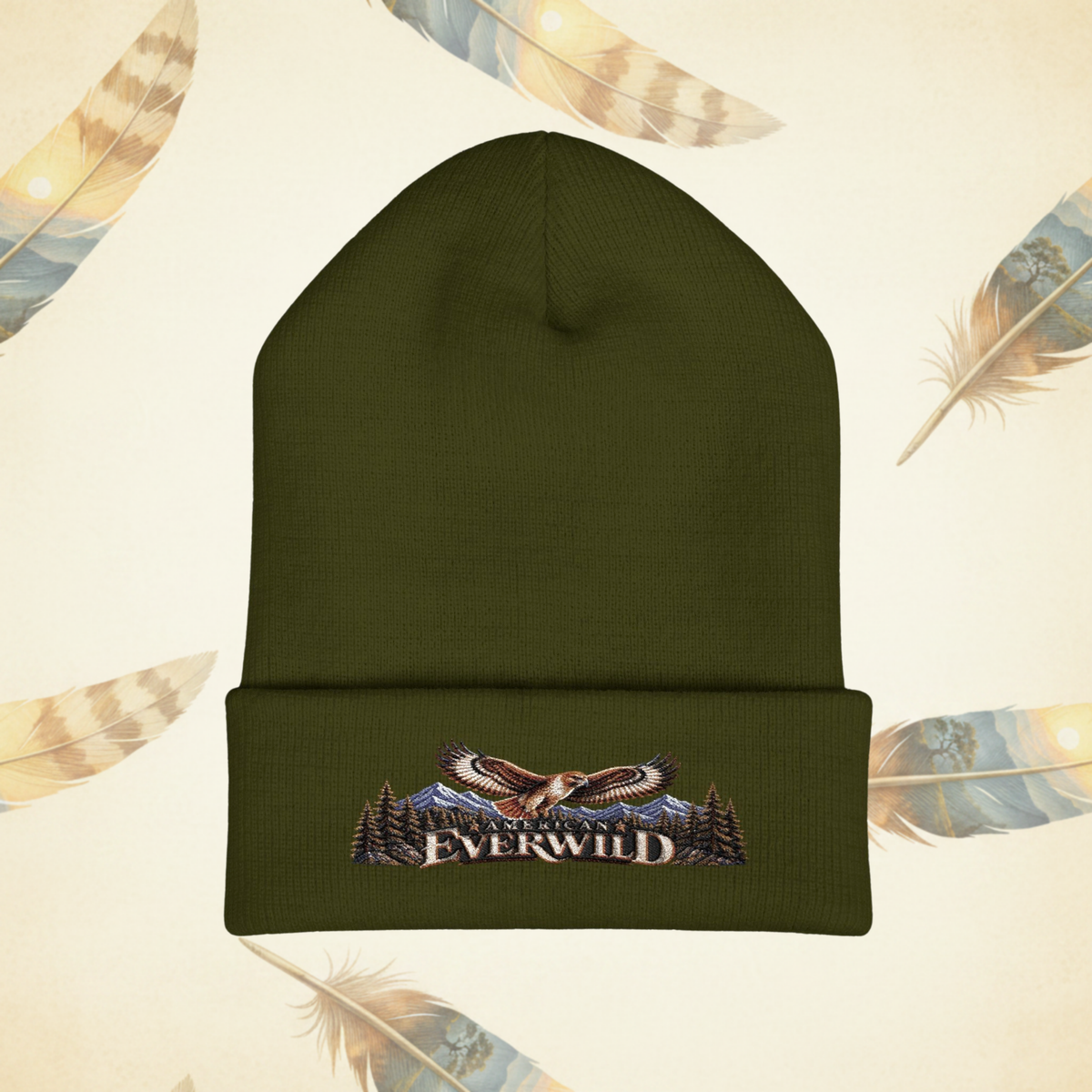 Olive Green American EverWild Beanie flat-lay on a cream-colored background of painted feathers.