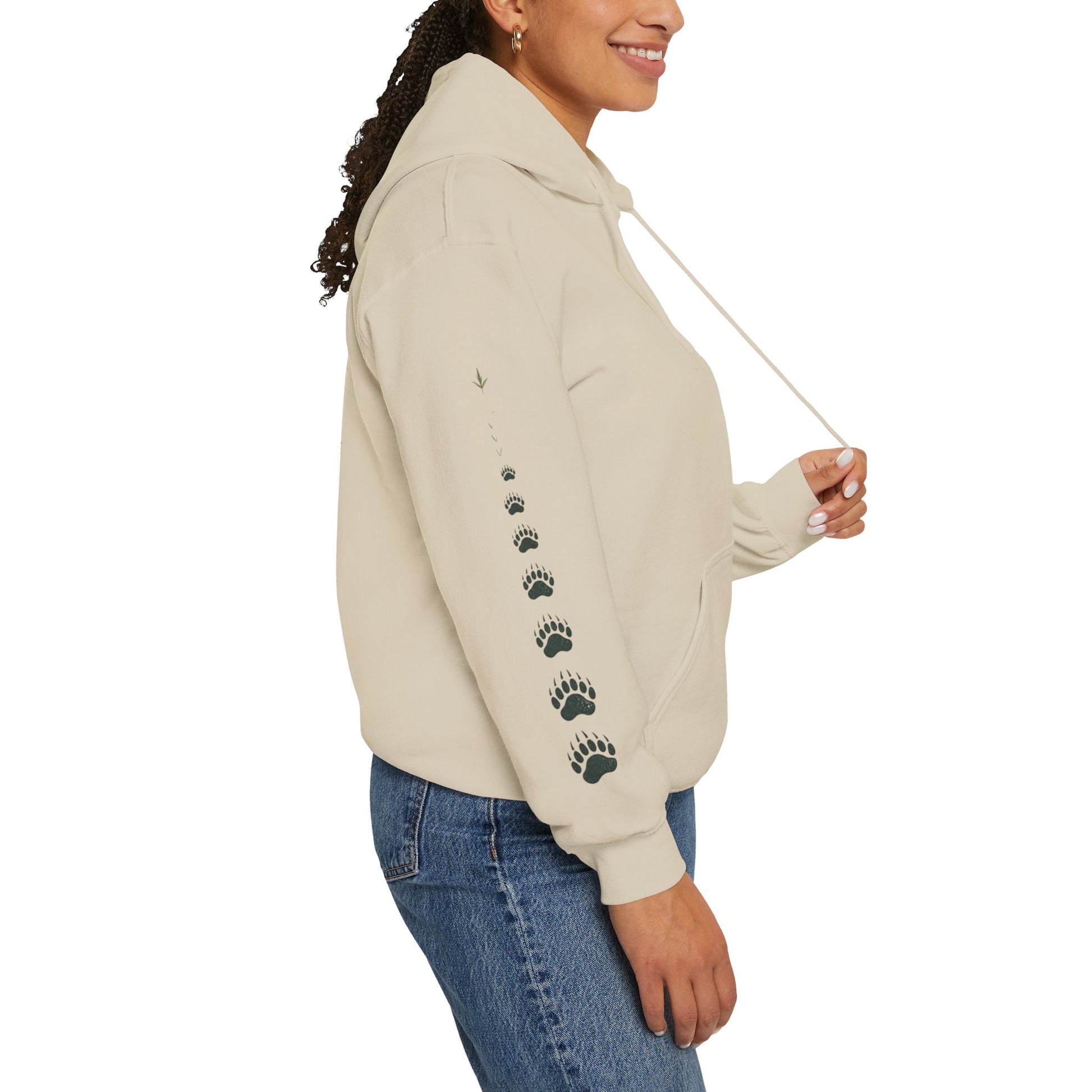 Beige pullover hoodie with paw-print sleeve details and drawstring hood