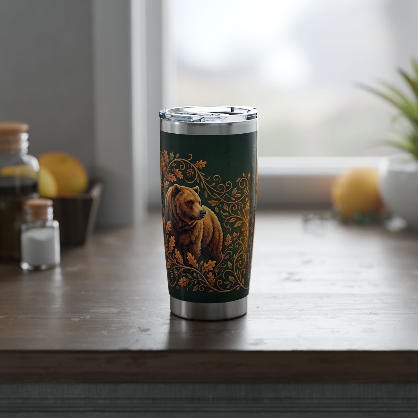 Insulated dark green tumbler with bear illustration and gold border, clear lid