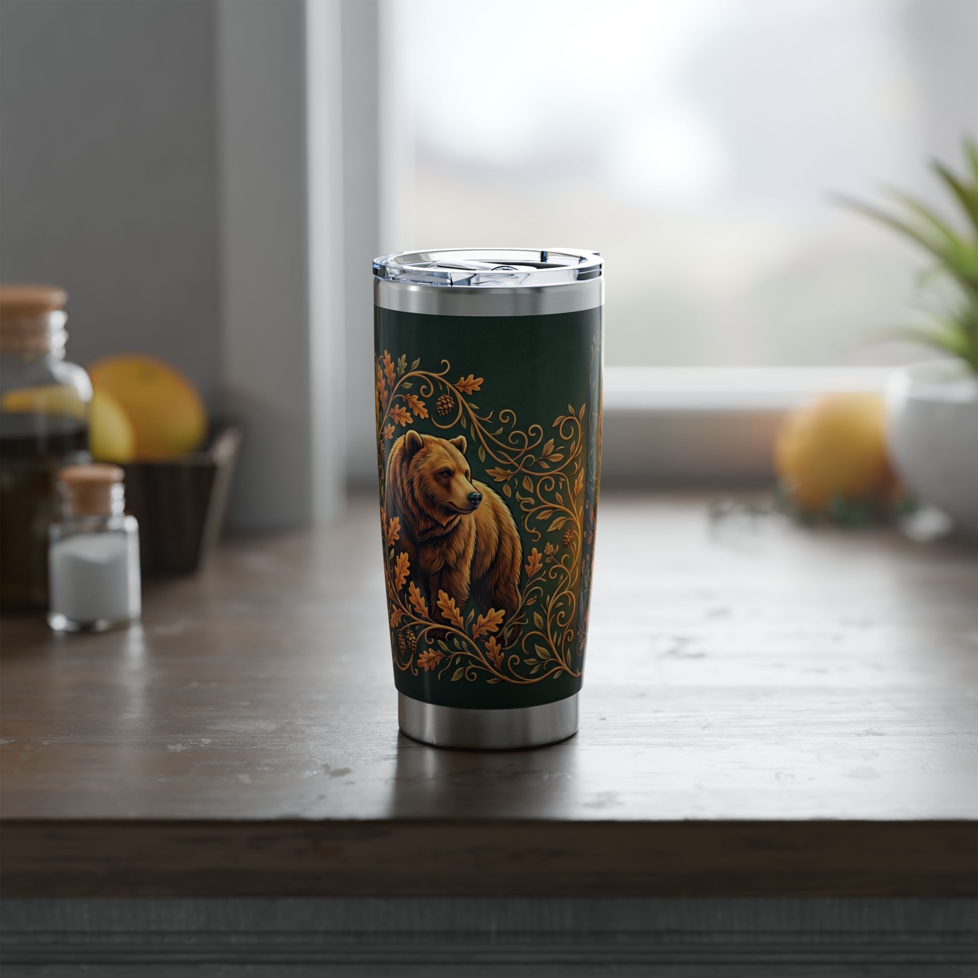 Insulated dark green tumbler with bear illustration and gold border, clear lid