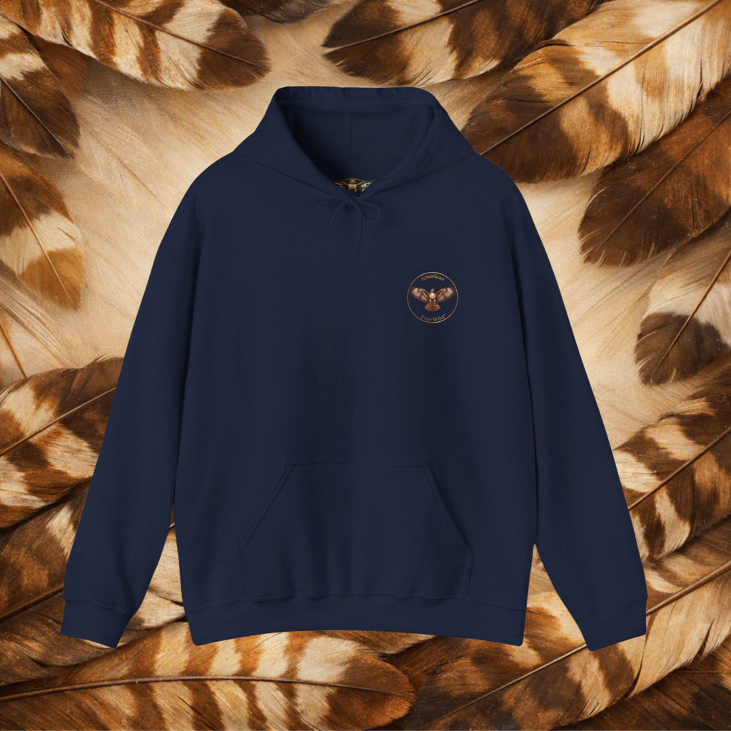 Navy Blue hoodie flat-lay with a circular hawk emblem, on a brown and cream feather background.