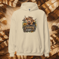 Sand-colored front-lay hoodie with a cute country cow leaning over a fence that says "I'm Praying For You." Has sunflowers and wild flowers with a cross and bible on a background a cream and brown feathers.