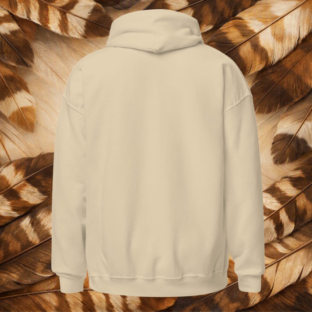 Sand-colored  back-lay hoodie on a background a cream and brown feathers.