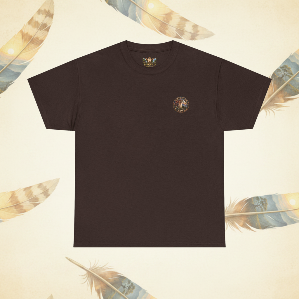 A dark brown short-sleeve crewneck t-shirt with a small circular multicolor graphic on the left chest, displayed flat against a cream-colored background decorated with feather illustrations.