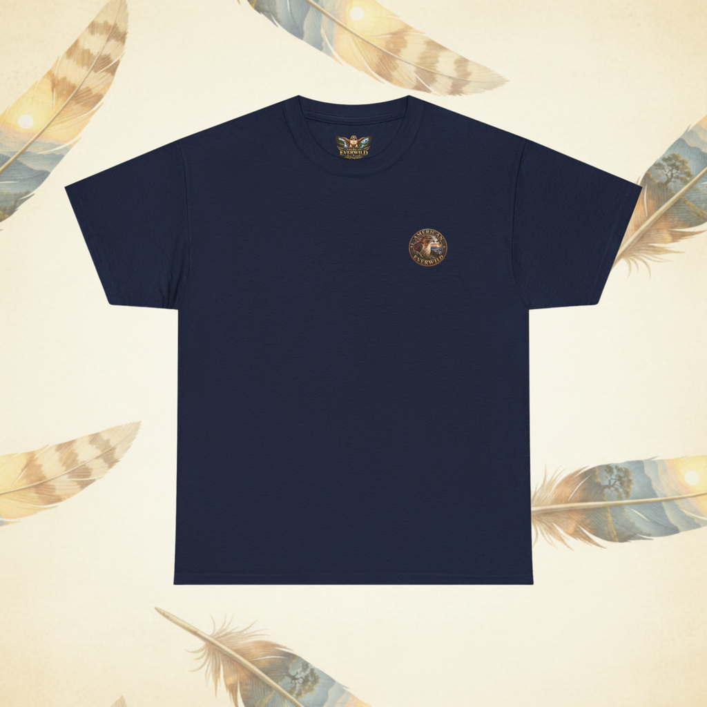 A navy blue short-sleeve crewneck t-shirt with a small circular gold and brown emblem printed on the left chest, displayed on a light beige background decorated with feather illustrations.