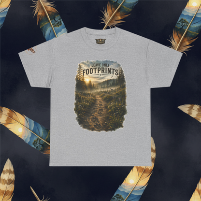 A light gray heather crewneck t-shirt featuring a large rectangular graphic print of a forest trail with the text 'LEAVE ONLY FOOTPRINTS'. The t-shirt is displayed flat against a dark background decorated with large, colorful feathers.