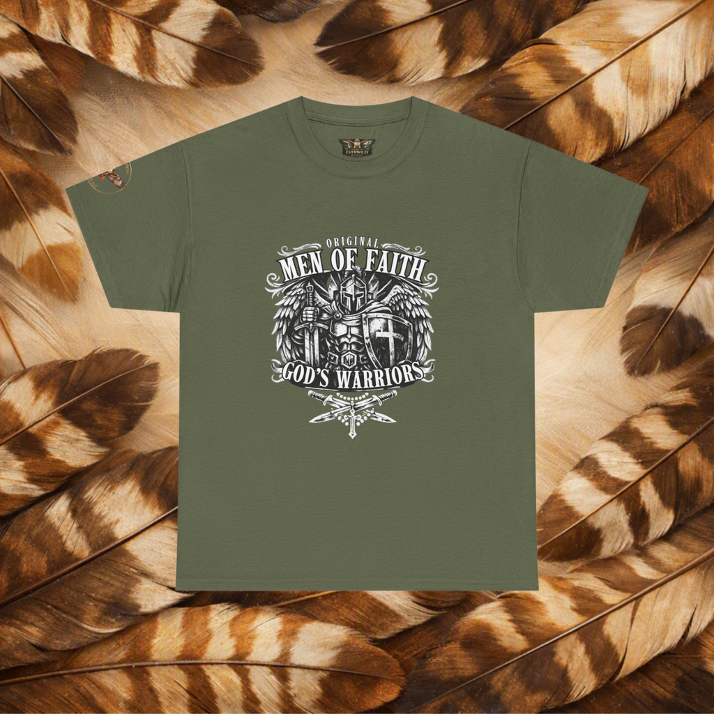 A Miltary green short-sleeve t-shirt with a white graphic print reading 'Original Men of Faith God's Warrior' and featuring a winged warrior emblem, laid flat on a background of brown and tan feathers.