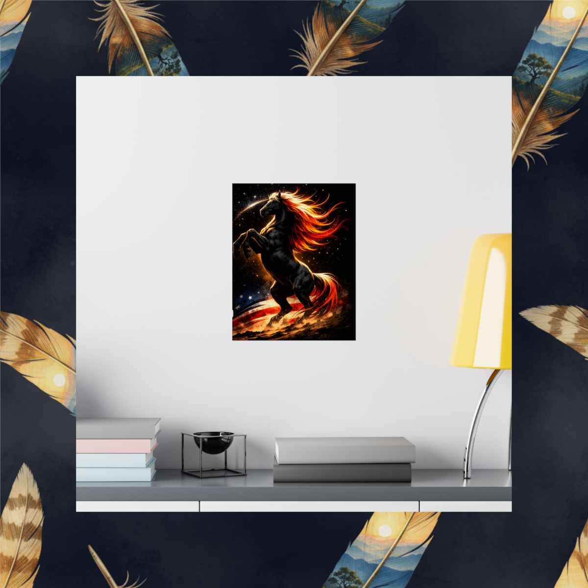 A framed or mounted wall art print showing a black horse with vivid orange and red flames, displayed on a white wall above a shelf with books and a lamp. The scene is framed by a dark decorative border with feather motifs.