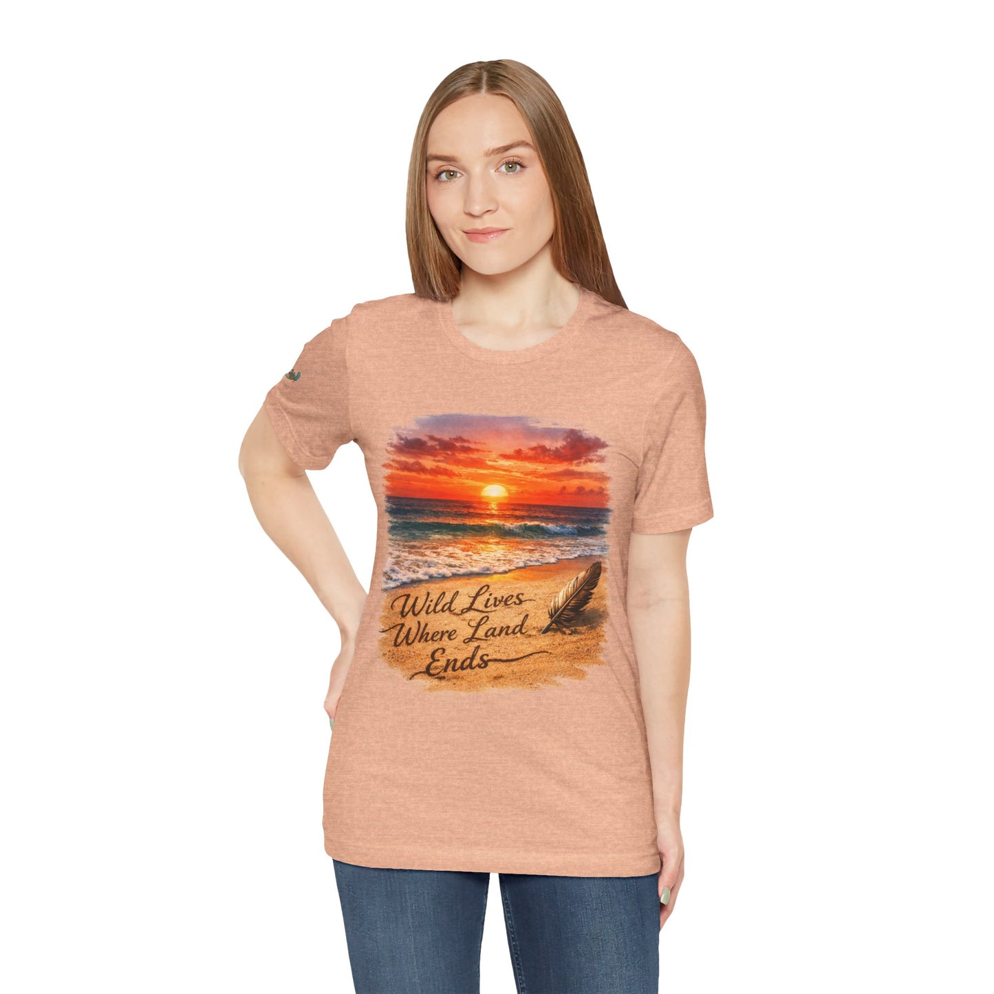 Heather peach crew-neck t-shirt with sunset beach graphic and coastal text on chest