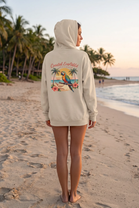 Cream coastal hoodie with hood and kangaroo pocket, back view with colorful beach graphic