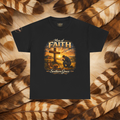 A black short-sleeve graphic t-shirt featuring a 'Men of Faith Southern Grace' Christian print with a cross and kneeling figure, displayed flat against a background of brown and beige feathers.