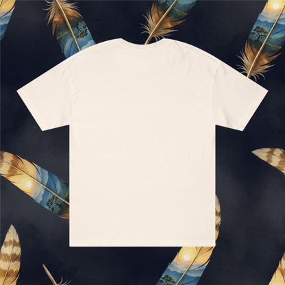 A blank cream colored short-sleeve t-shirt shown from the back, laid flat against a dark navy background patterned with large decorative feathers.